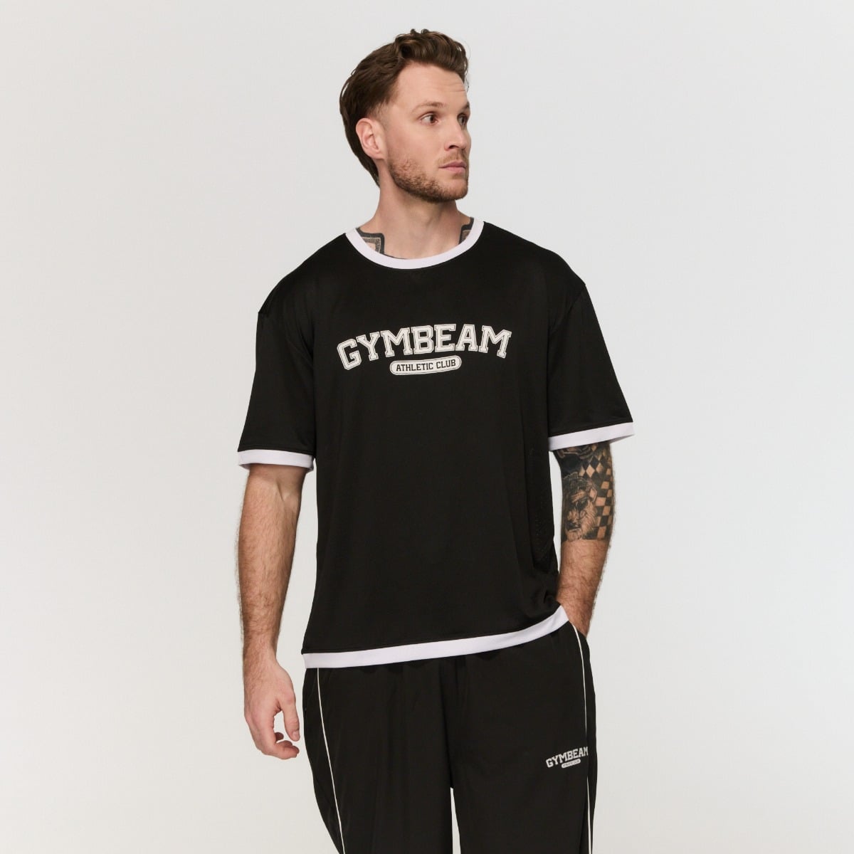 Oversize Varsity T-Shirt in Black - GymBeam